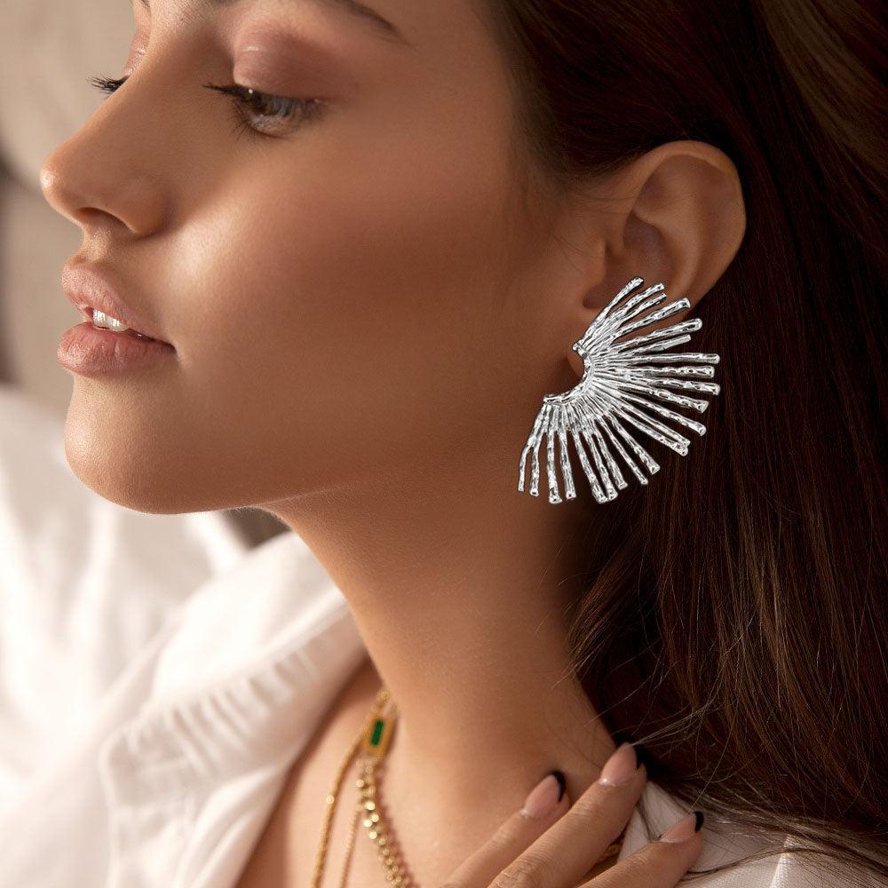 Abstract Metal Earrings - Jewelry Store by Erik Rayo