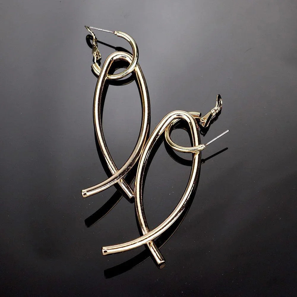 Gold Curved Metal Dangle Earrings - Jewelry Store by Erik Rayo