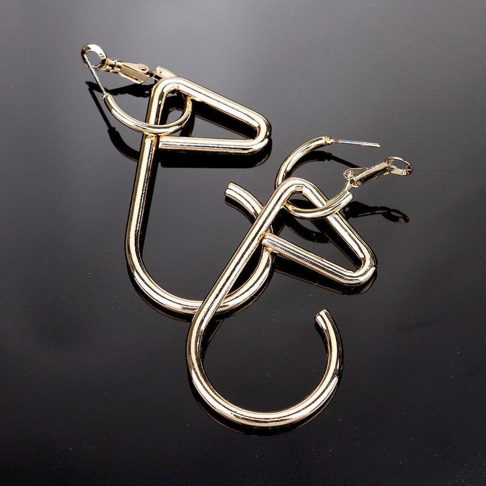 Gold Curved Metal Dangle Earrings - Jewelry Store by Erik Rayo