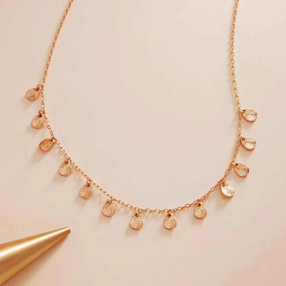 Gold Textured Metal Teardrop Station Necklace - Jewelry Store by Erik Rayo