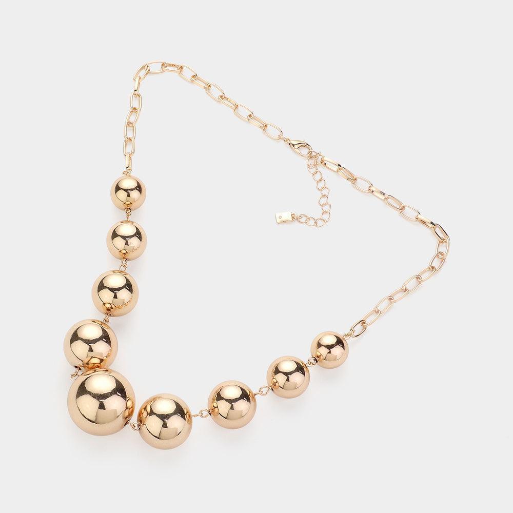 Gold Metal Ball Necklace - Jewelry Store by Erik Rayo