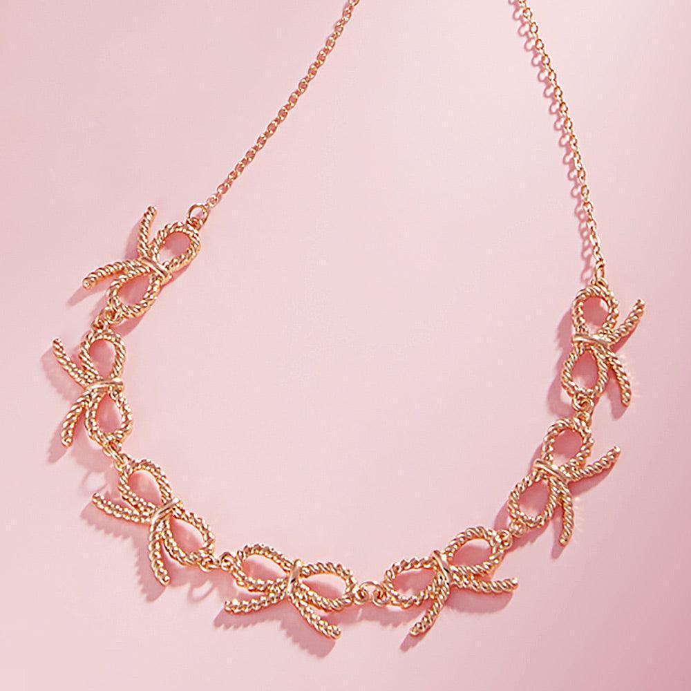 Gold Textured Metal Wire Bow Link Necklace - Jewelry Store by Erik Rayo