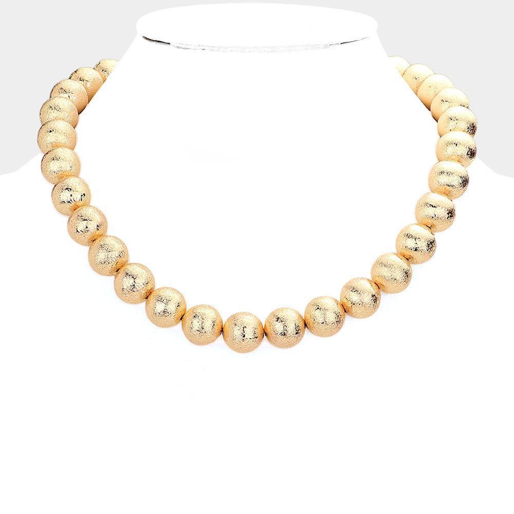Gold Metal Ball Necklace - Jewelry Store by Erik Rayo