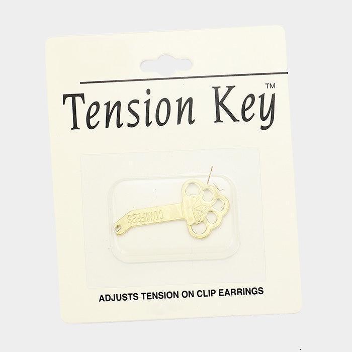 Gold Adjusts Tension on Clip Earrings - Jewelry Store by Erik Rayo