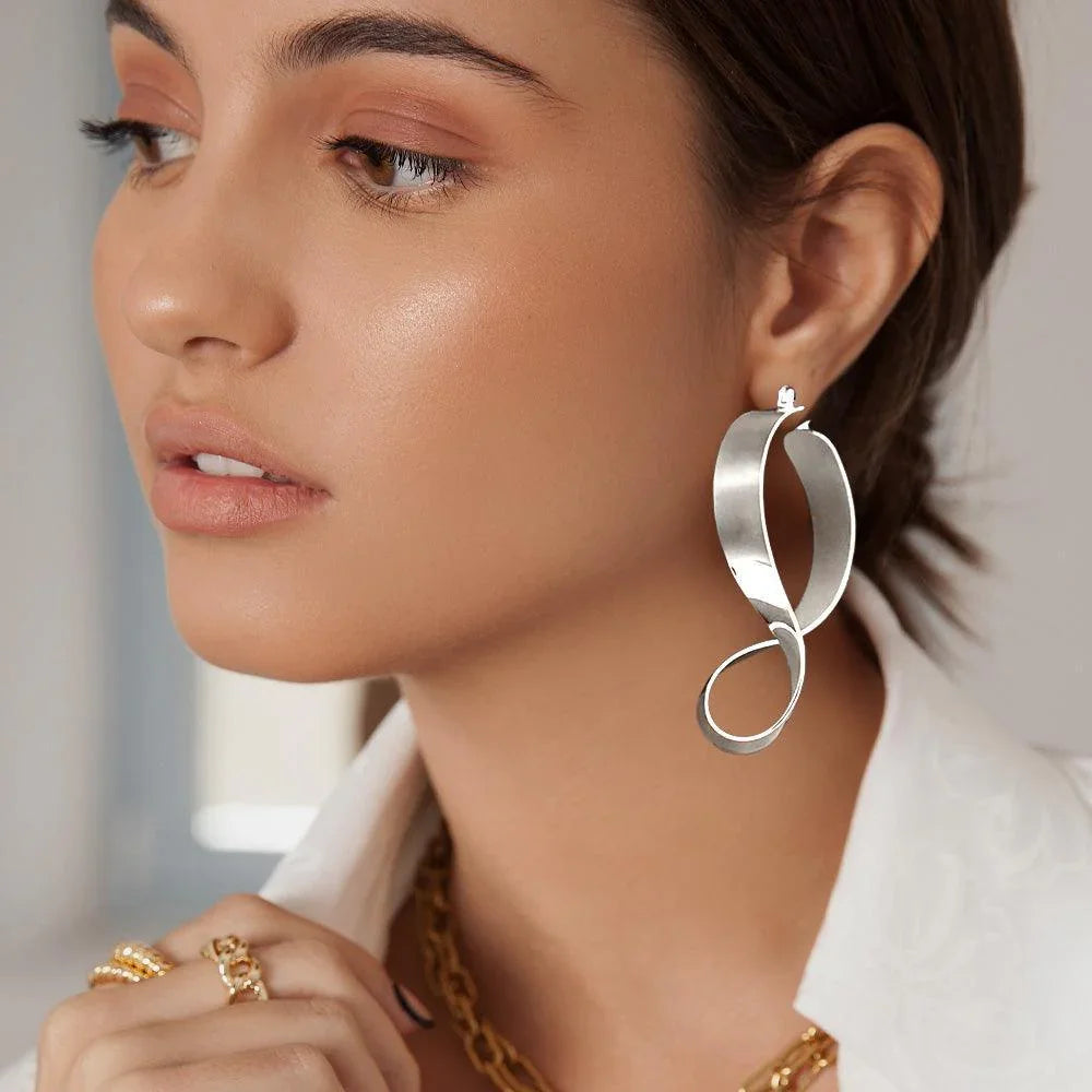 Abstract Metal Pin Catch Earrings - Jewelry Store by Erik Rayo