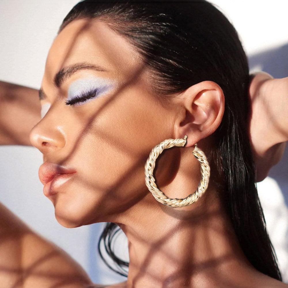 Gold Brushed Metal Twisted Hoop Pin Catch Earrings - Jewelry Store by Erik Rayo