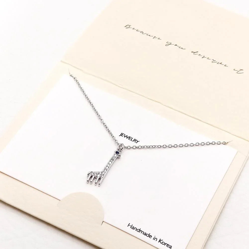 Silver Rhinestone Embellished Metal Giraffe Pendant Necklace - Jewelry Store by Erik Rayo
