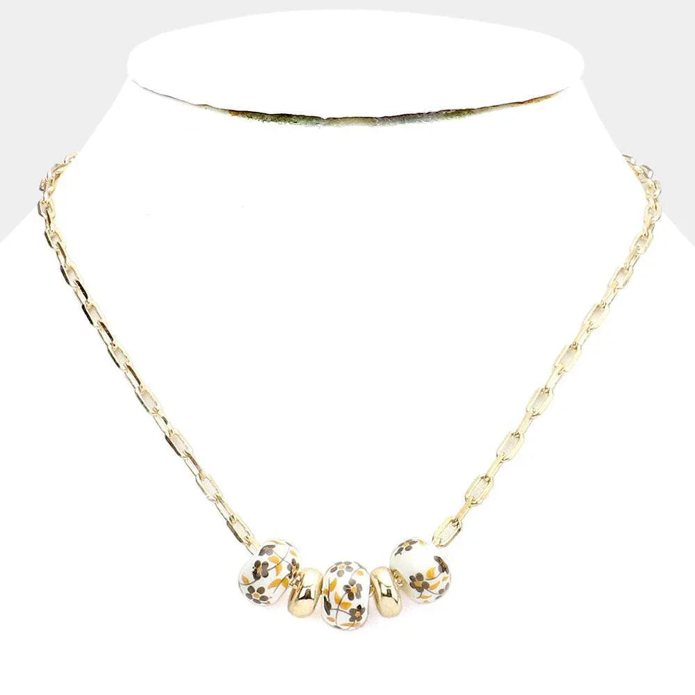 Brown Flower Printed Triple Bead Pendant Necklace - Jewelry Store by Erik Rayo