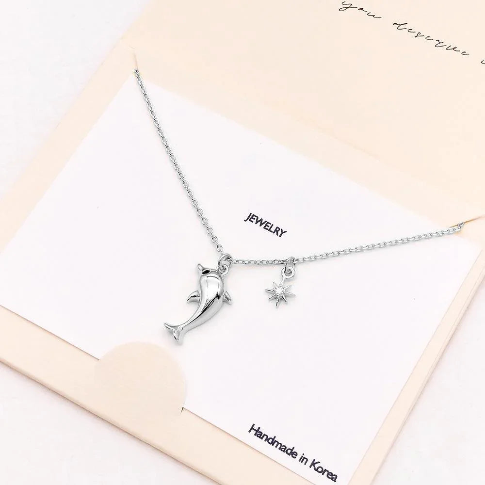 Silver CZ Embellished Dolphin North Star Pendant Necklace - Jewelry Store by Erik Rayo