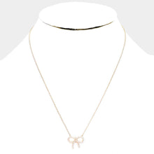 Load image into Gallery viewer, Gold Gold Dipped Cubic Zirconia Bow Pendant Necklace
