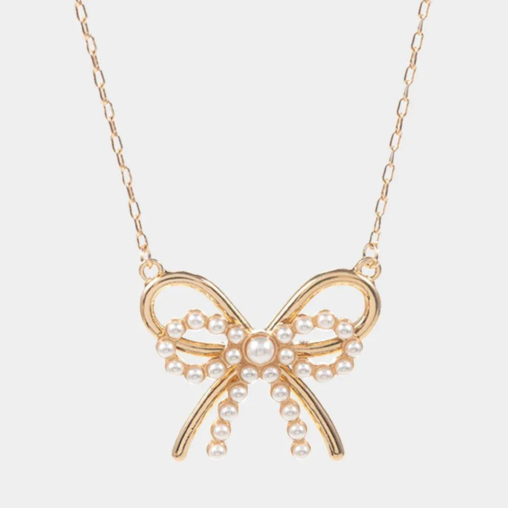 Cream Pearl Metal Bow Pendant Necklace - Jewelry Store by Erik Rayo