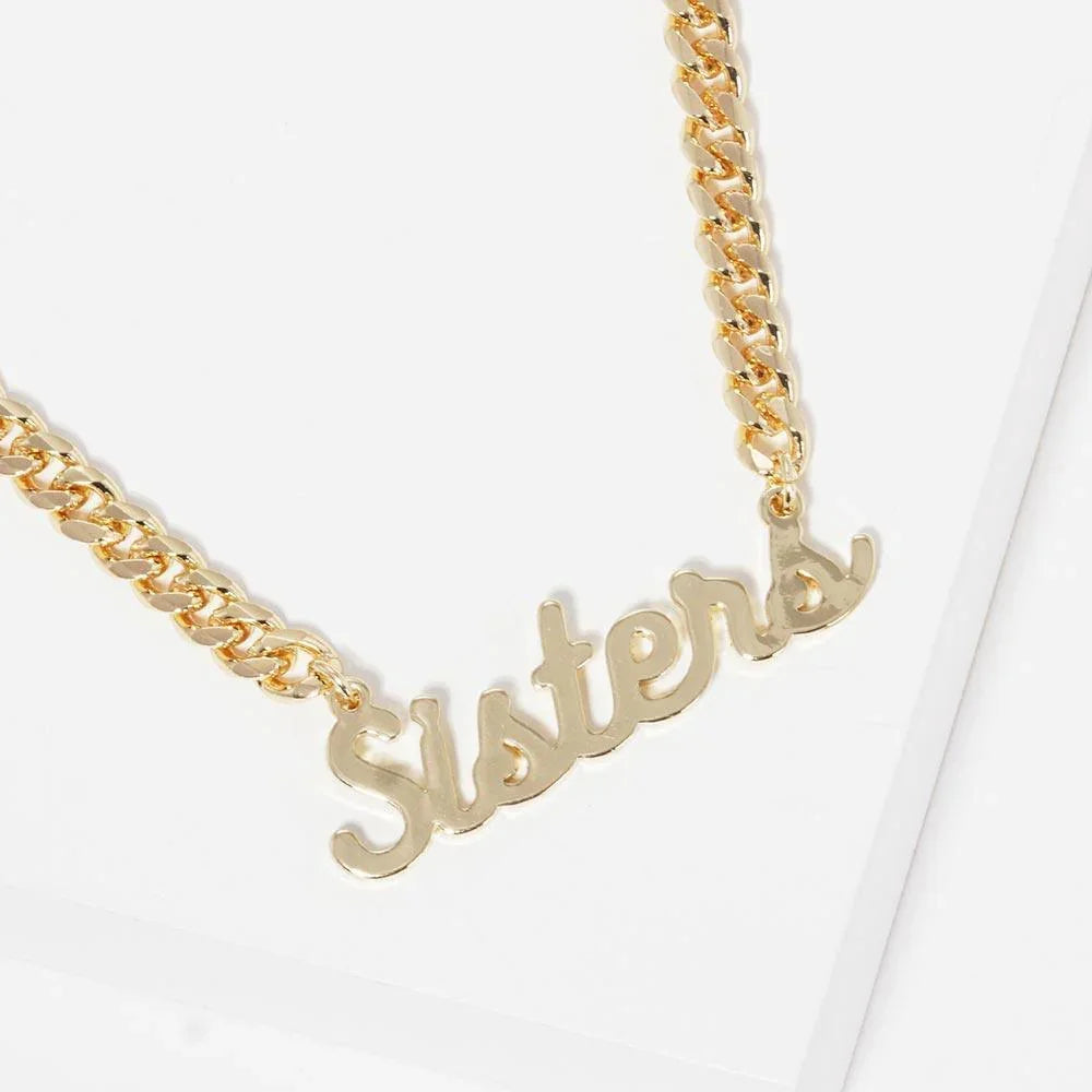 Gold Sister Message Pendant Gold Dipped Metal Necklace - Jewelry Store by Erik Rayo