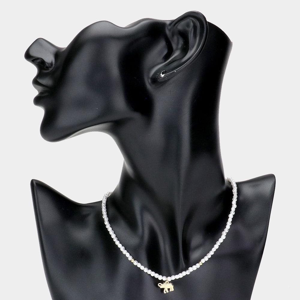 Cream Metal Elephant Pendant Pearl Necklace - Jewelry Store by Erik Rayo
