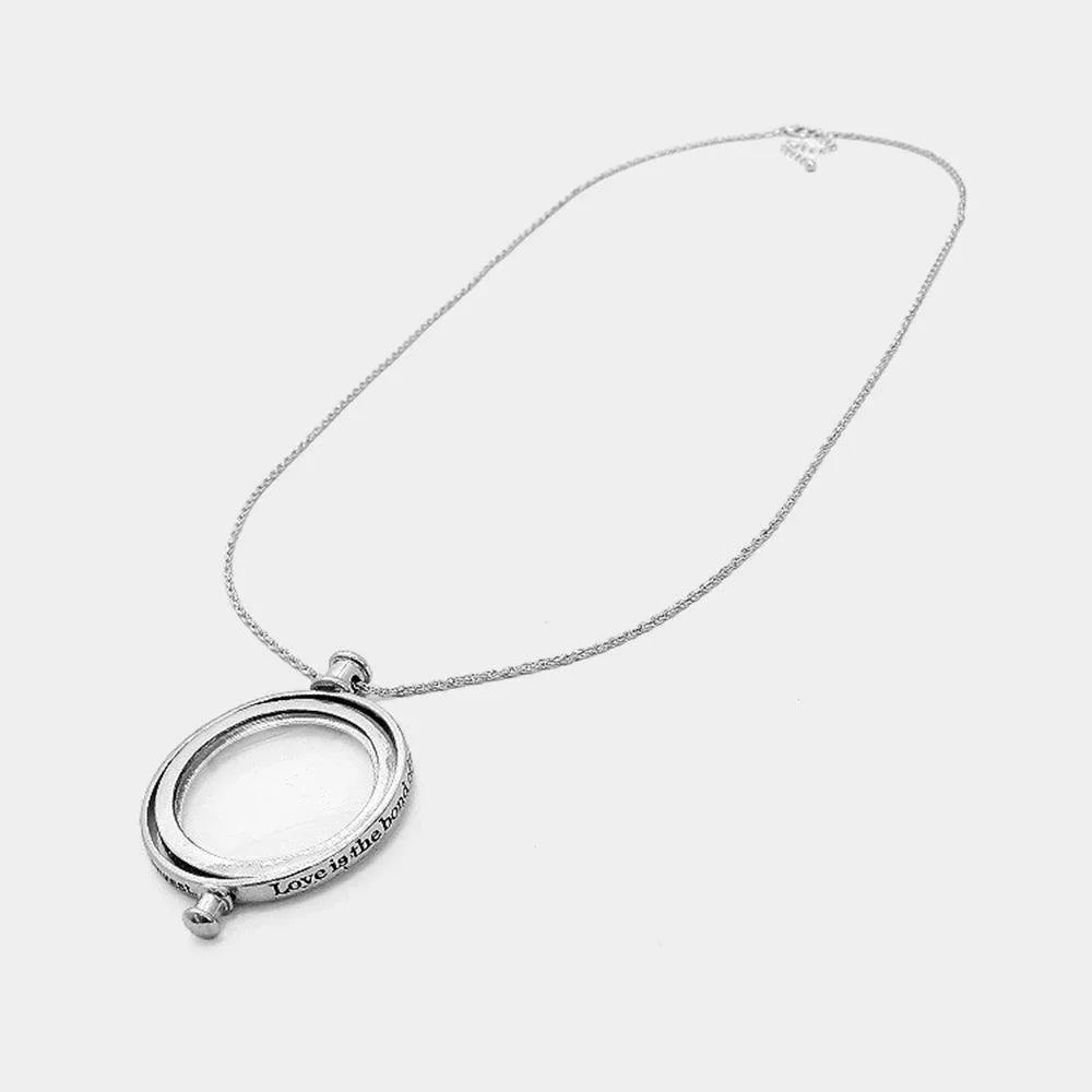 Revolving Magnifying Glass Pendant Necklace - Jewelry Store by Erik Rayo