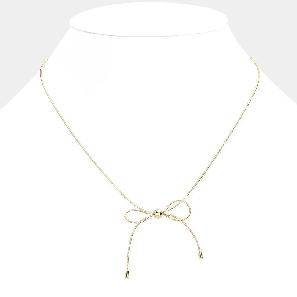 Gold Brass Metal Bow Pendant Necklace - Jewelry Store by Erik Rayo