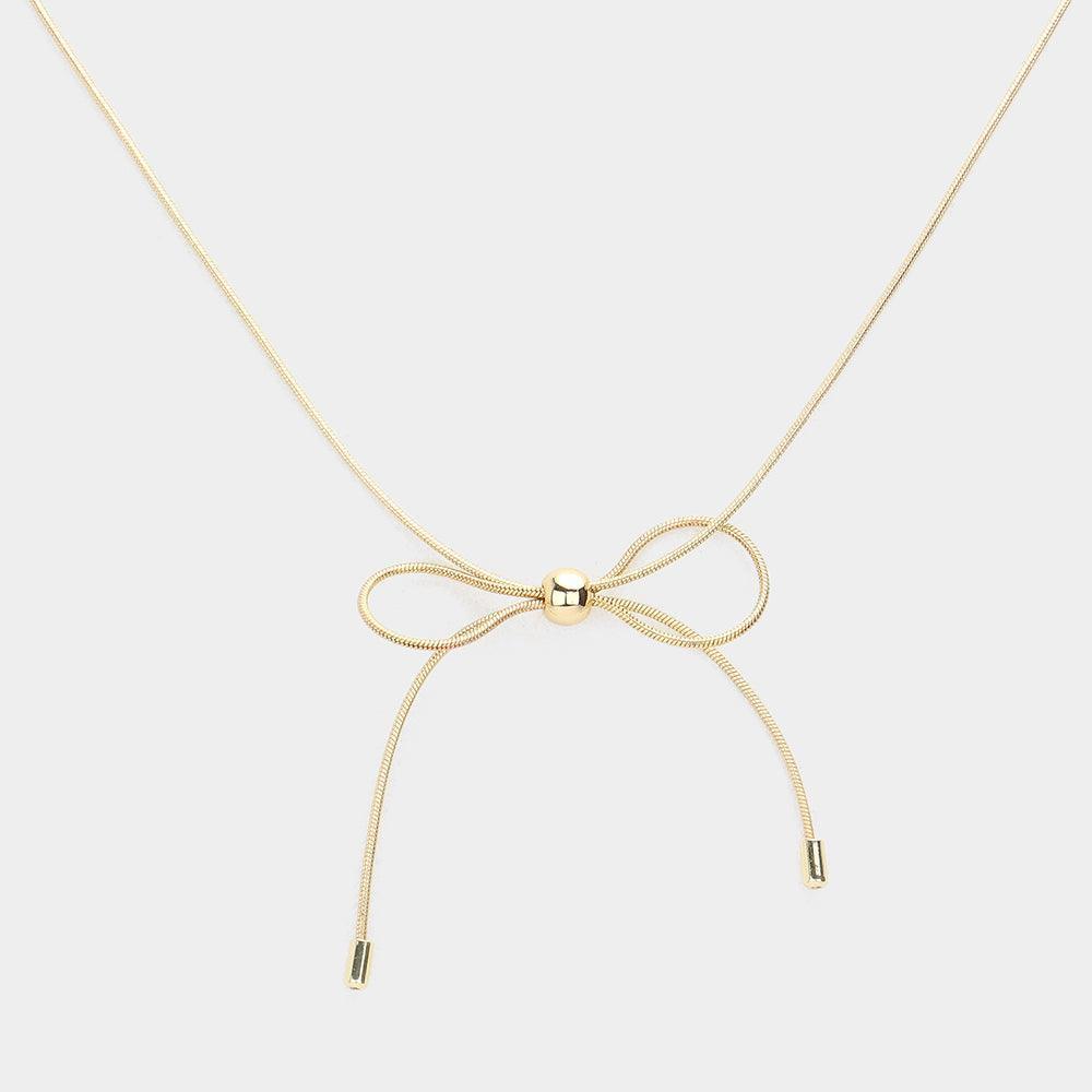 Gold Brass Metal Bow Pendant Necklace - Jewelry Store by Erik Rayo