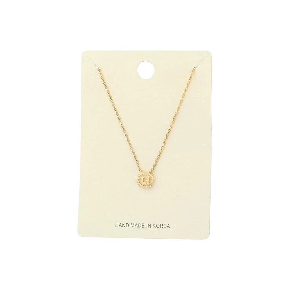 Gold Textured Matte Metal AT Symbol Pendant Necklace - Jewelry Store by Erik Rayo