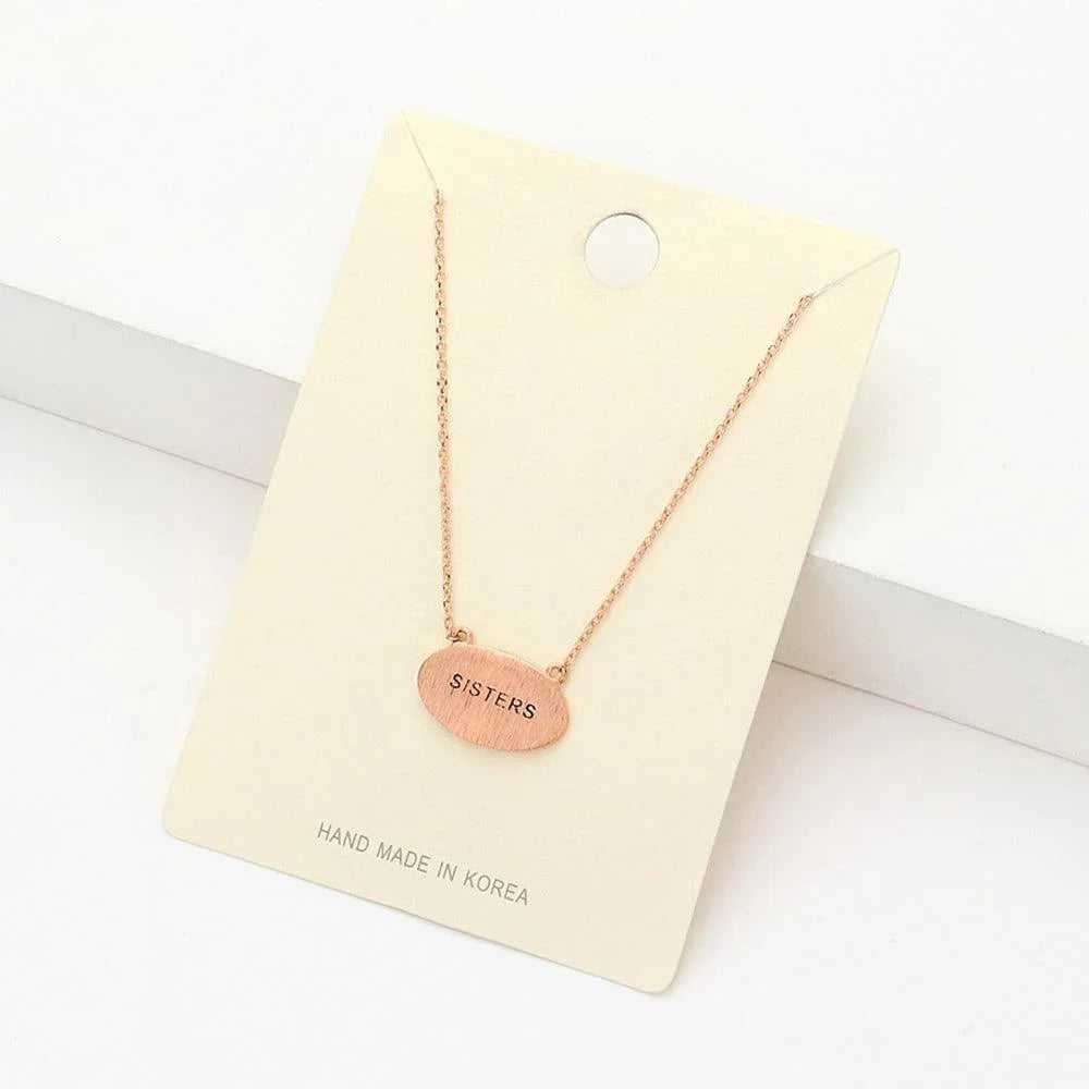 Rose Gold "Sisters" Message Brass Oval Metal Pendant Necklace - Jewelry Store by Erik Rayo