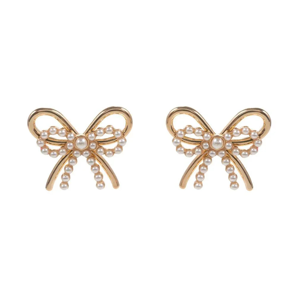 Cream Pearl Metal Bow Earrings - Jewelry Store by Erik Rayo