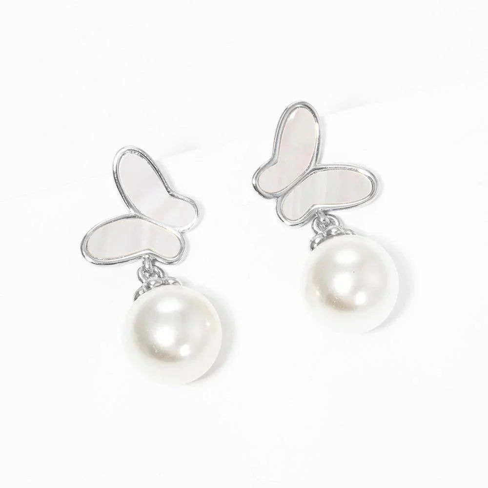 White White Gold Dipped Butterfly Pearl Stud Earrings - Jewelry Store by Erik Rayo
