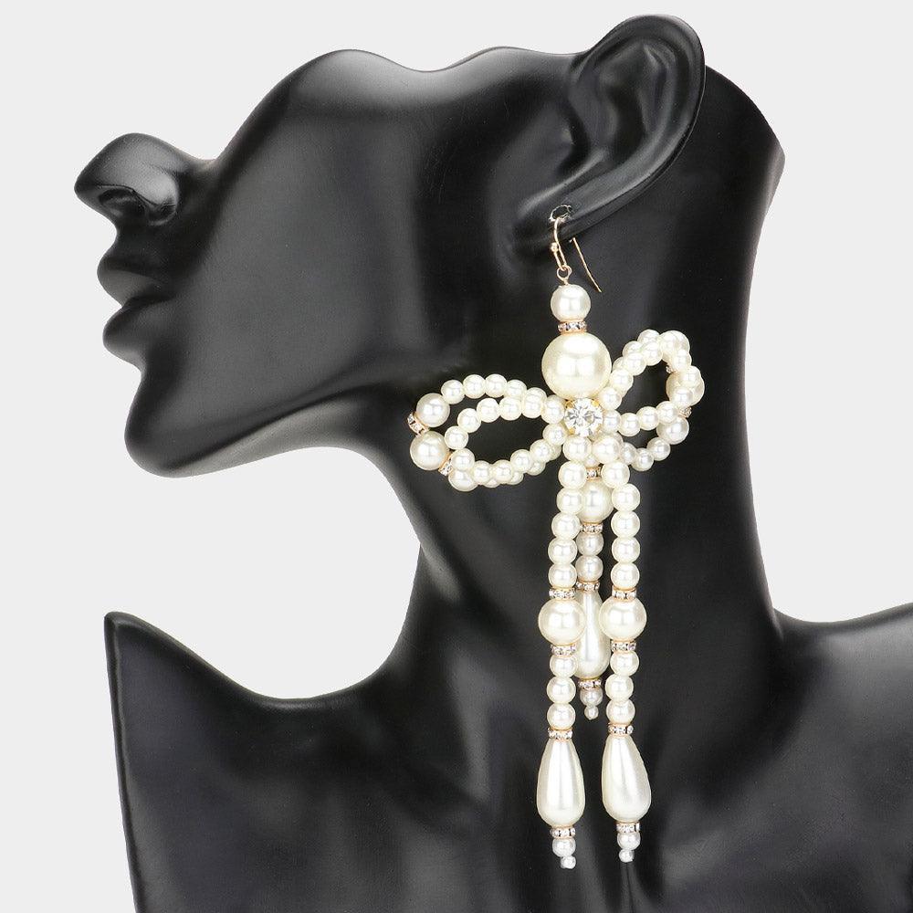 Cream Oversized Pearl Beaded Bow Dangle Earrings - Jewelry Store by Erik Rayo
