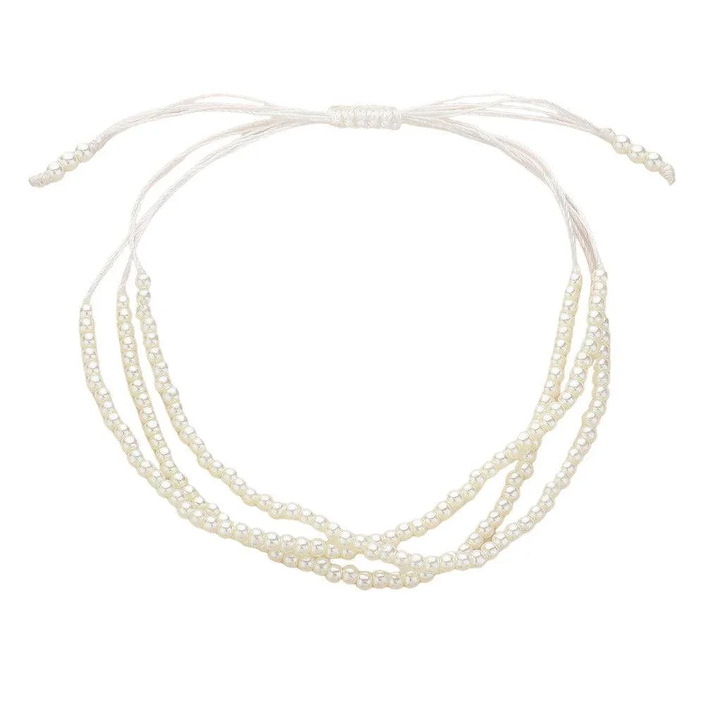 White Seed Pearl Beaded Triple Layered Cinch Pull Tie Bracelet - Jewelry Store by Erik Rayo