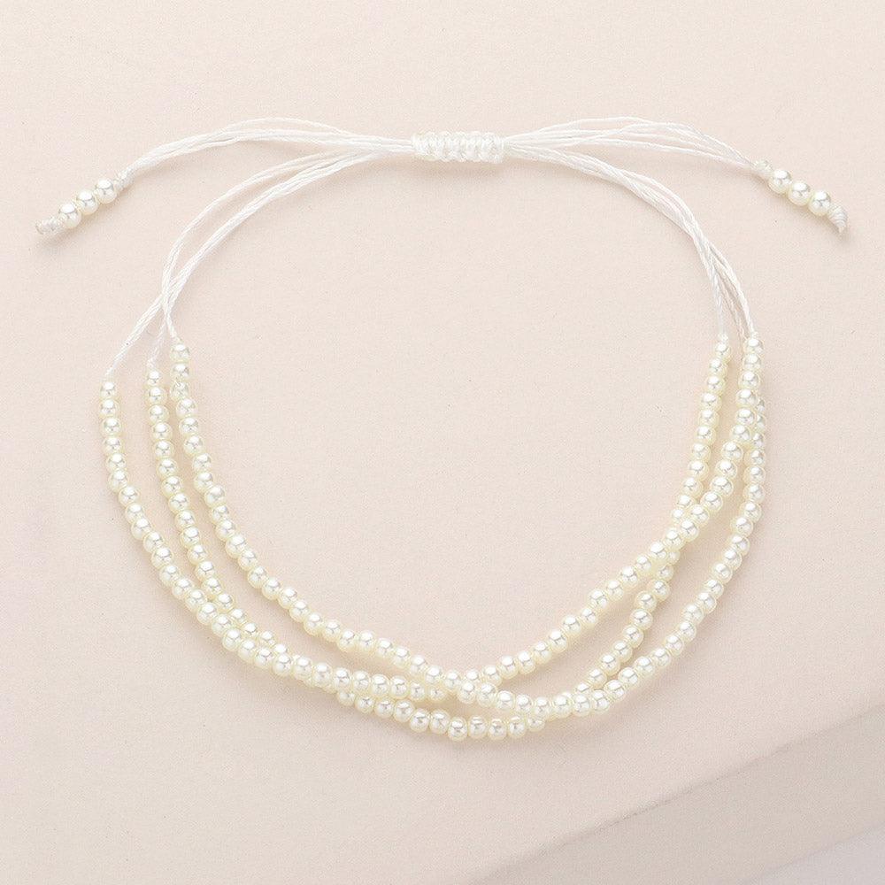 White Seed Pearl Beaded Triple Layered Cinch Pull Tie Bracelet - Jewelry Store by Erik Rayo