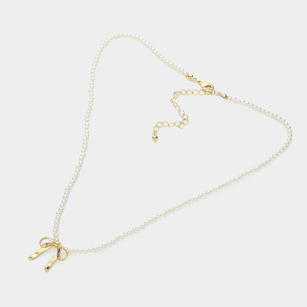 Cream Metal Bow Pendant Pearl Necklace - Jewelry Store by Erik Rayo