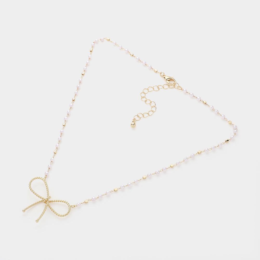 White Textured Metal Bow Pendant Pointed Pearl Station Necklace