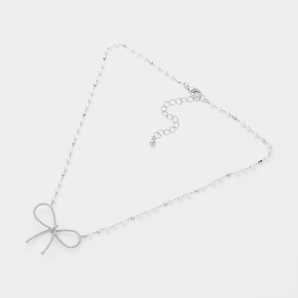 White Textured Metal Bow Pendant Pointed Pearl Station Necklace