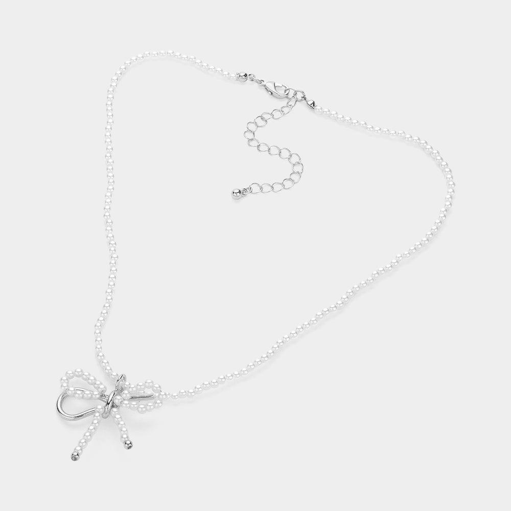 White Pearl Bow Pendant Necklace - Jewelry Store by Erik Rayo
