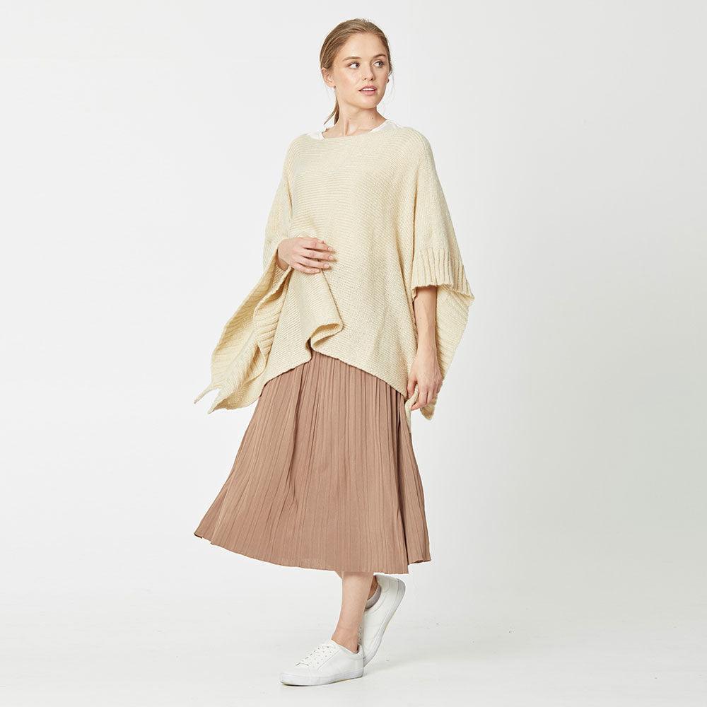 Beige Yarn Knitted Poncho - Jewelry Store by Erik Rayo