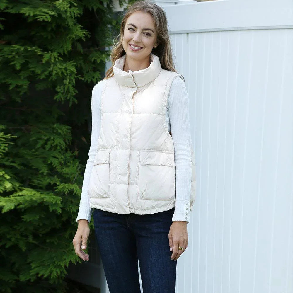 Ivory Solid Light Front Pockets Button Short Adjustable Vest - Jewelry Store by Erik Rayo