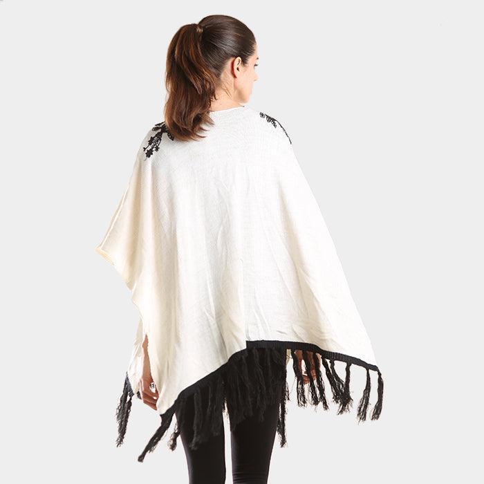Black Embroidered flower vine & tassel poncho sweater - Jewelry Store by Erik Rayo