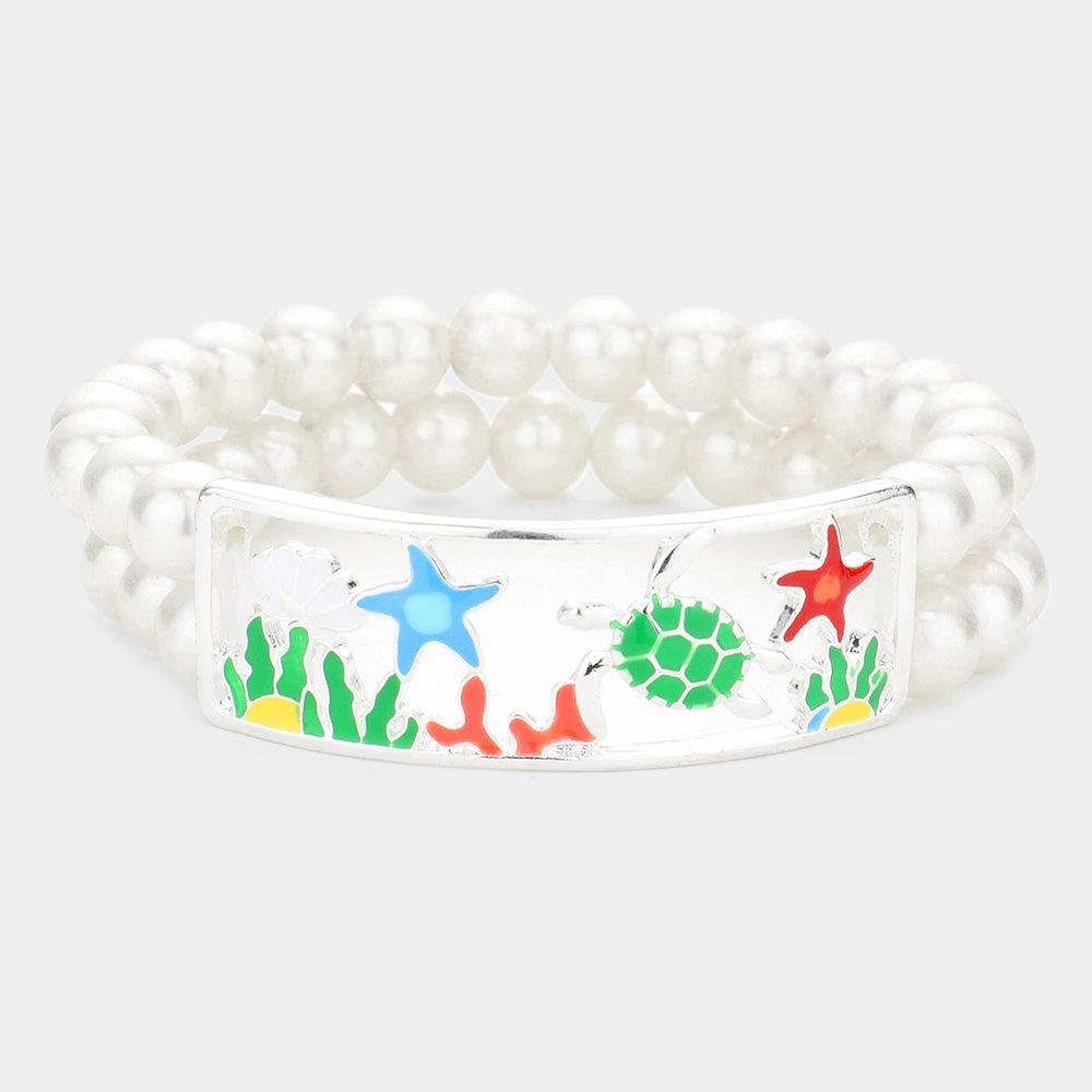 Cream Enamel Starfish Turtle Coral Accented Double Layered Pearl Stretch Bracelet