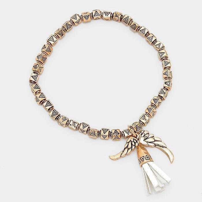 Gold Faux suede tassel & wing charm aztec metal bead stretch bracelet - Jewelry Store by Erik Rayo