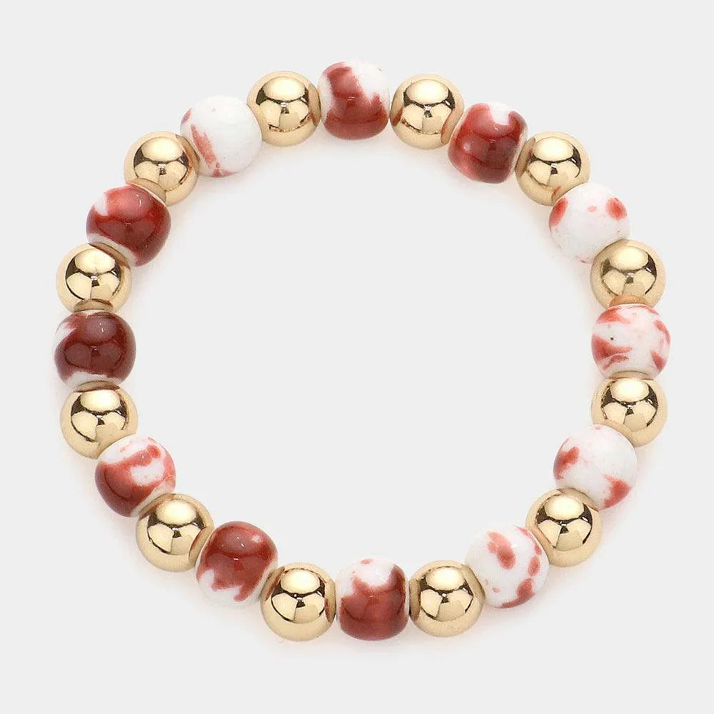 Burgundy Colored Bead Accented Metal Ball Stretch Bracelet - Jewelry Store by Erik Rayo