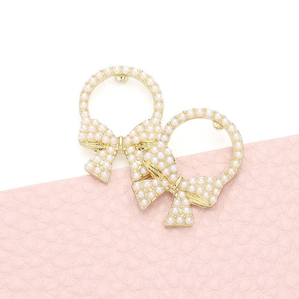 Cream Pearl Embellished Bow Stud Earrings - Jewelry Store by Erik Rayo