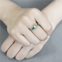 Load image into Gallery viewer, Green Peridot CZ Round &amp; Pair Cut Stainless Steel 3 Stone Cocktail Ring - Jewelry Store by Erik Rayo
